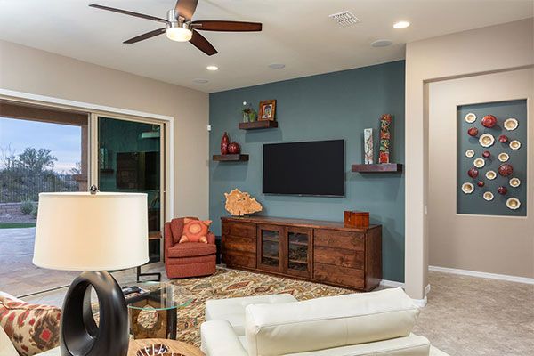 family room with white and blue walls. 