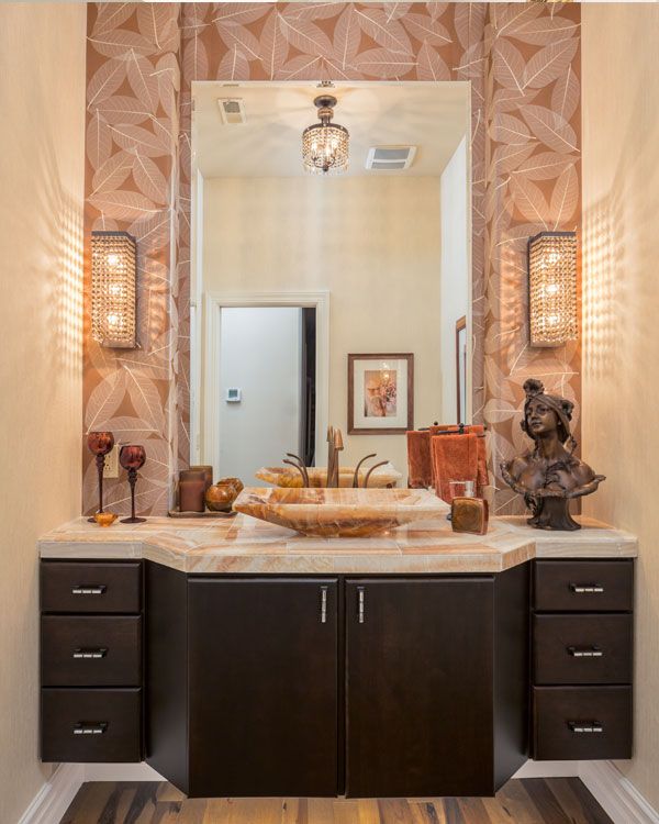 dark colored drawers under light colored sink top. 