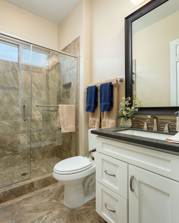 white drawers with dark colored sink top. 