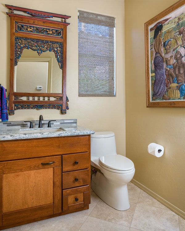 light colored walls with blue marbled sink top. 