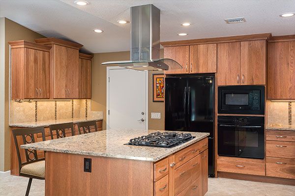 light colored cabinets with kitchen island. 