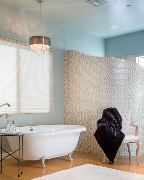 Light colored walls with wooden floors. 