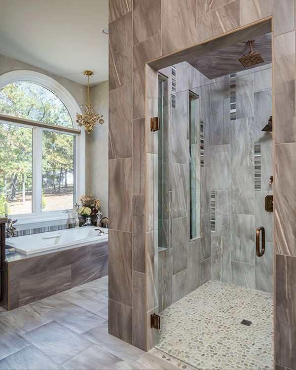 Modern bathroom with glass shower door. 