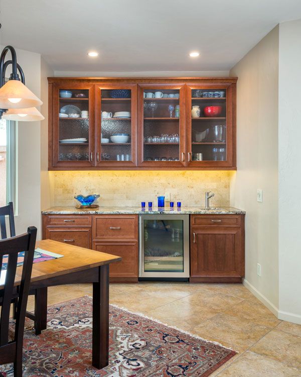 Marbled flooring with white walls. 