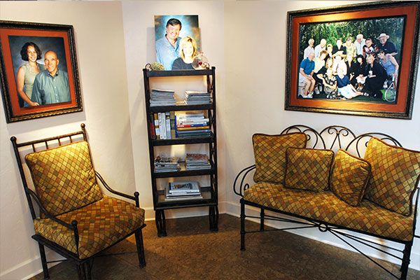 White walls and dark color flooring. 