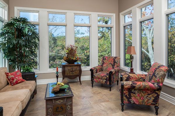 Back room with windowed walls. 