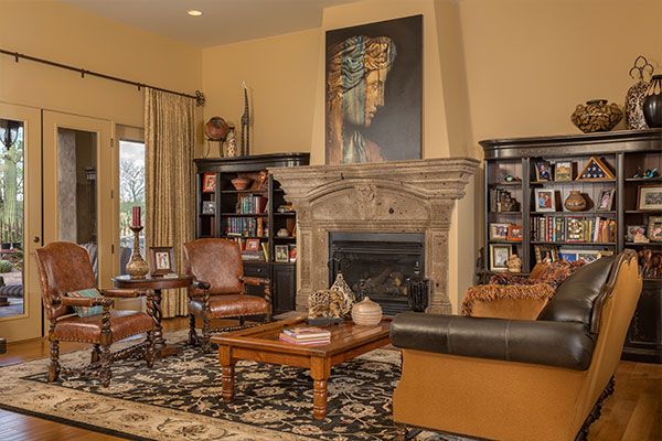 Light colored walls and wood floor with rug. 