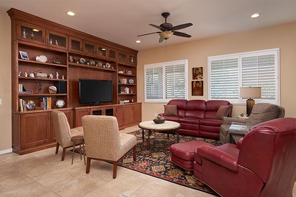 Tile floor with light colored walls. 