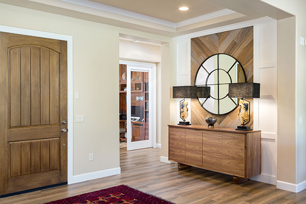 Light colored walls with wooden floors.