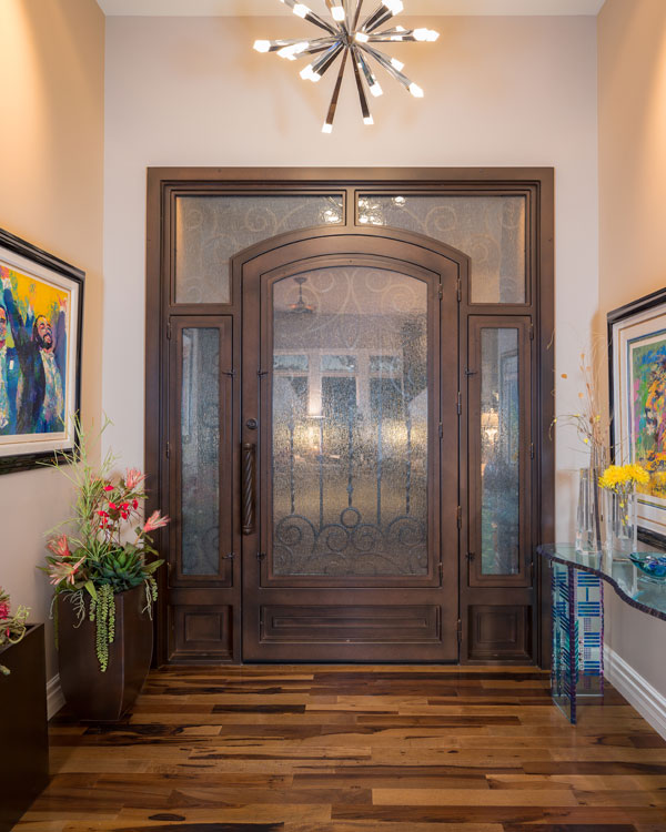 Wooden framed door with glass.