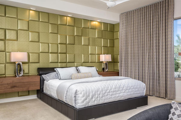 Textured wall with curtains over window