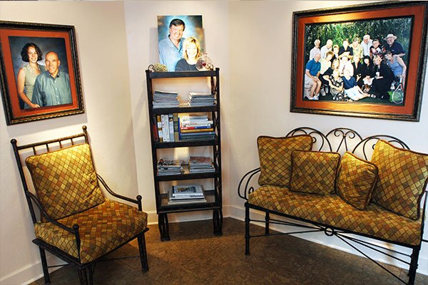 White walls and dark color flooring.